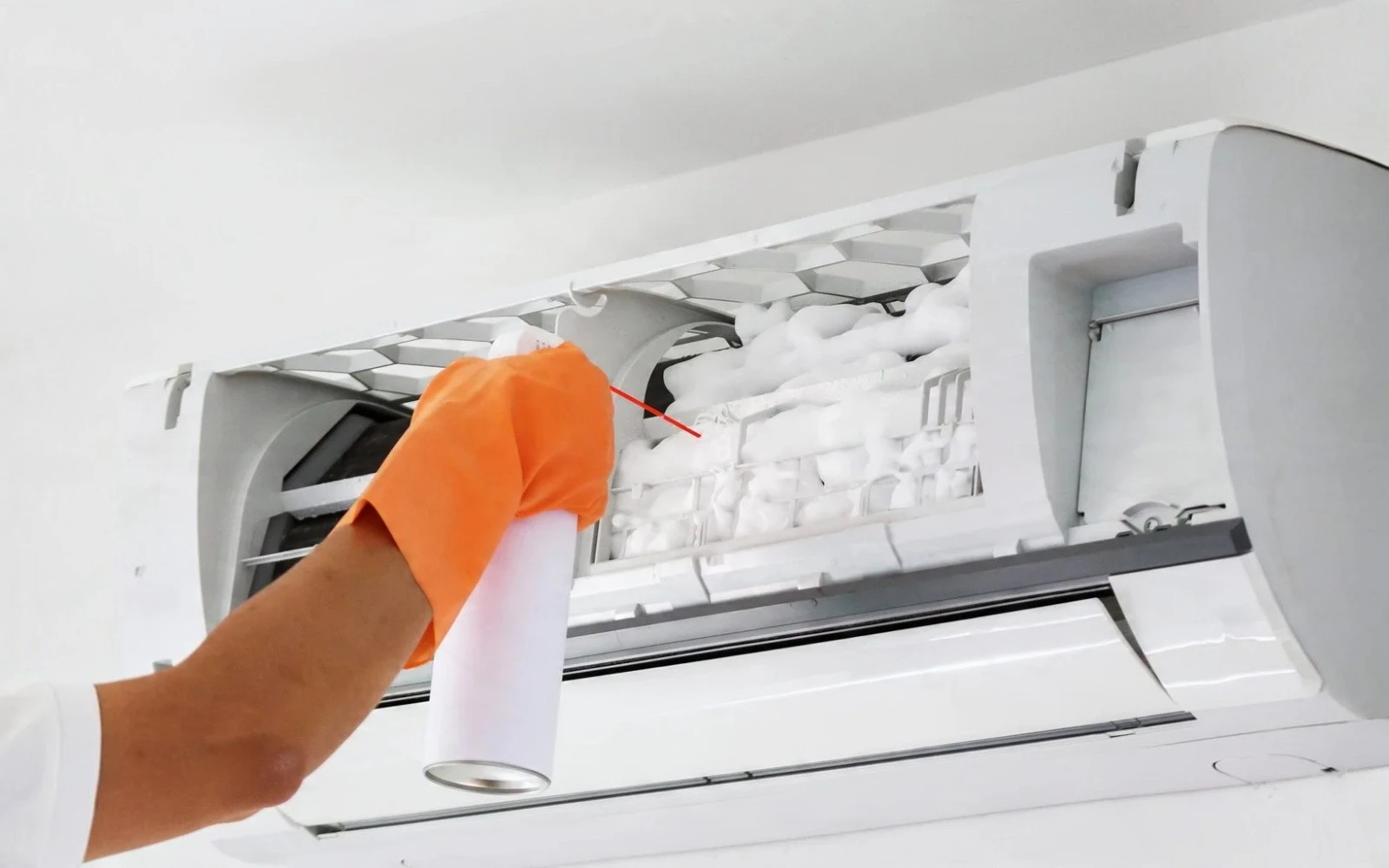 Royal AC technician servicing an HVAC unit